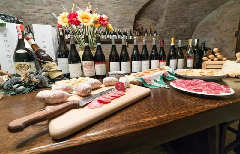 Piedmont: Winery Tour, Taste Barolo, Barbaresco & Local Food - Centuries-old cellar visit with owner Charles