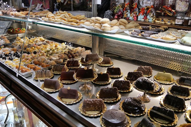 Turin Chocolate Tasting Walking Tour - Stop 1 in a historic shop: atmosphere plus chocolate facts