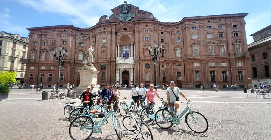 Turin: Highlights and Hidden Gems Guided Bike Tour - Porta Palatina, Palazzo Carignano, and the city’s architecture talk
